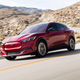 The Ford Mustang Mach-E driving alongside the other Ford EVs offered in 2021